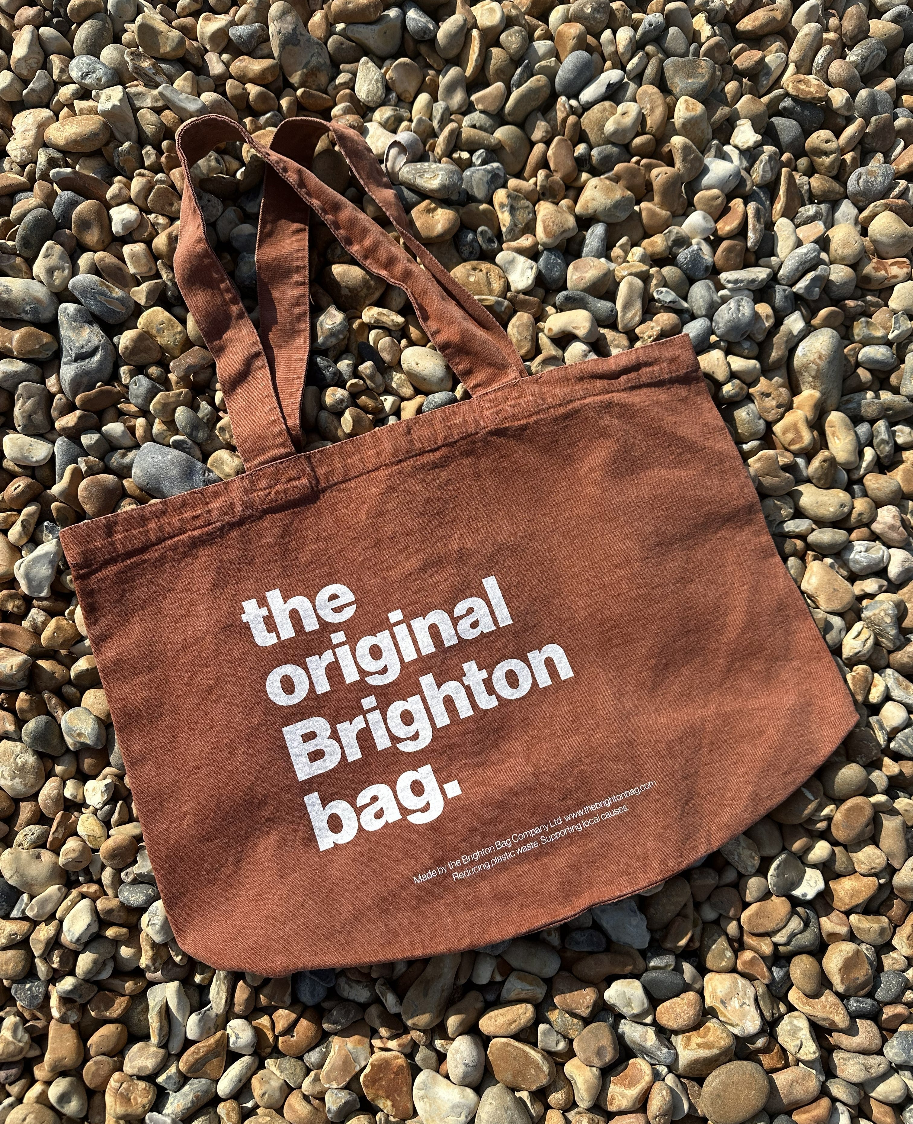 the original Brighton bag · terracotta