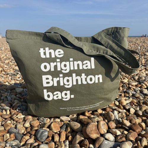 Khaki Brighton bag - hanging on white
