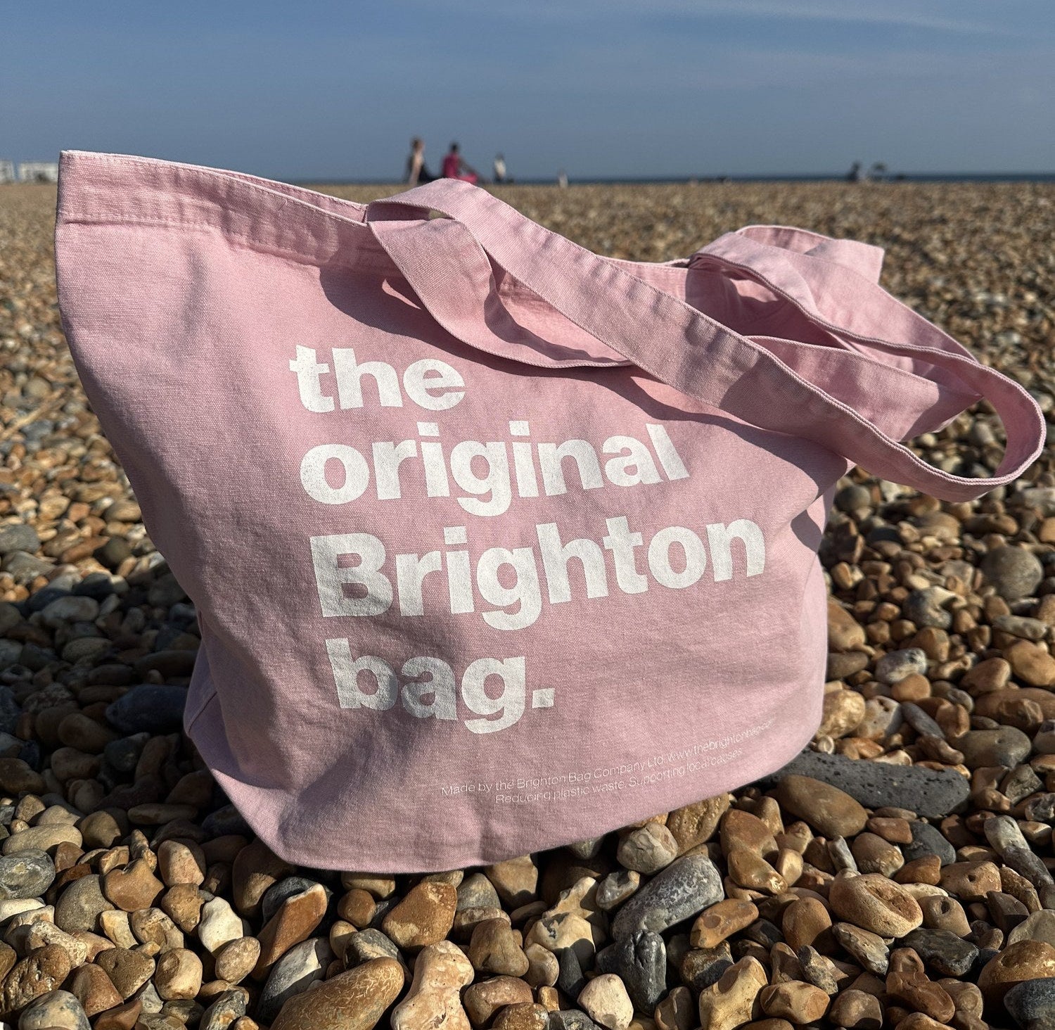 Rock pink Brighton bag - hanging on white